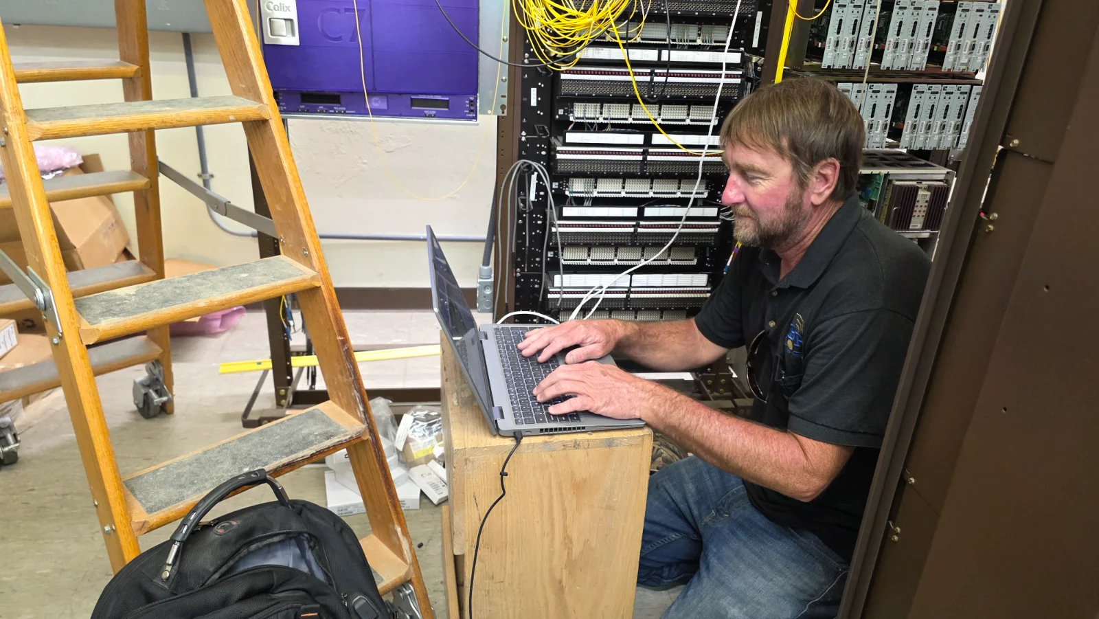 A BPS technician working in the Bernie central office